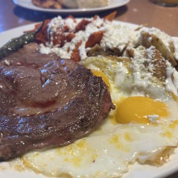 Ely’s Restaurant - I can't look at this steak anymore ugh.. underneath is a big hole in the eggs - Breakfast & Brunch Near Me - Henderson, Nevada