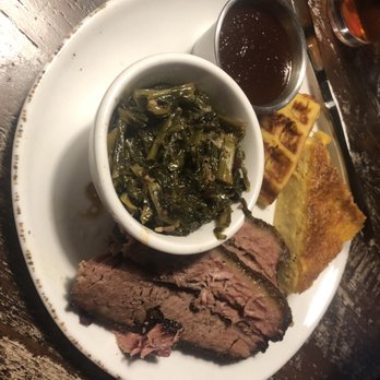 Wolf River Brisket - Sliced brisket, collard greens and cheese grits. So, good! - Southern Near Me - Germantown, Tennessee Wolf River Brisket - Sliced brisket, collard greens and cheese grits. So, good! - Southern Near Me - Germantown, Tennessee