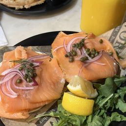 Salmon, bagel, fresh juice Salmon, bagel, fresh juice