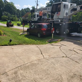 Youngs Tree Tech - Closer view in setting up crane around non working car - Tree Services Near Me - Raleigh, North Carolina