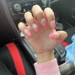 Sola Salon Studios - Pink french tip nails with a cute star on my ring finger