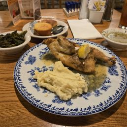 Herb roasted chicken, mashed potatoes, turnip greens, biscuit and cornbread