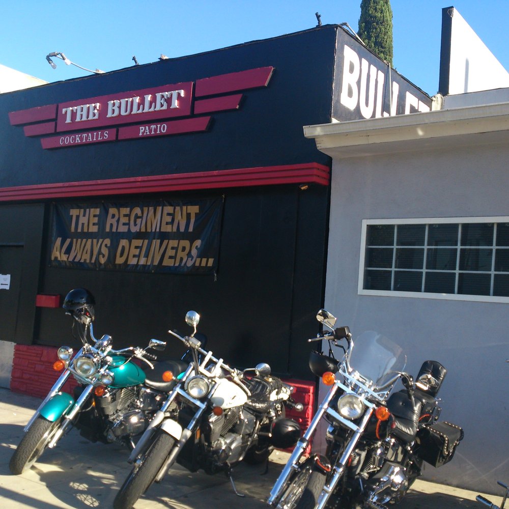 The Bullet - Limited Motorcycle parking in front of the Bullet Bar: reminiscent of the 1970's pre-Aids feeling of freedom & liberation. - Gay Bars Near Me - North Hollywood, California The Bullet - Limited Motorcycle parking in front of the Bullet Bar: reminiscent of the 1970's pre-Aids feeling of freedom & liberation. - Gay Bars Near Me - North Hollywood, California