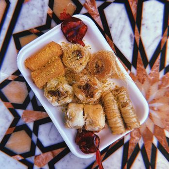 Albaghdady Restaurant & Bakery - a plate of food on a table - Bakeries Near Me - Richardson, Texas Albaghdady Restaurant & Bakery - a plate of food on a table - Bakeries Near Me - Richardson, Texas
