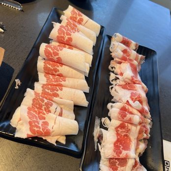 Let's Gogi - Left is very fatty brisket. Right is very thinly sliced beef belly. - Korean Near Me - Downey, California Let's Gogi - Left is very fatty brisket. Right is very thinly sliced beef belly. - Korean Near Me - Downey, California