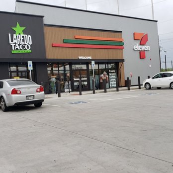 7-Eleven - a car parked in front of a 7 - eleven taco store - Convenience Stores Near Me - Dallas, Texas