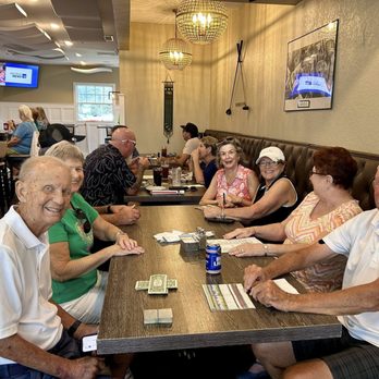 Tavern At The Glen - Friends after Golfing enjoying a drink, sandwich and friendly conversation - American Near Me - Ocala, Florida Tavern At The Glen - Friends after Golfing enjoying a drink, sandwich and friendly conversation - American Near Me - Ocala, Florida