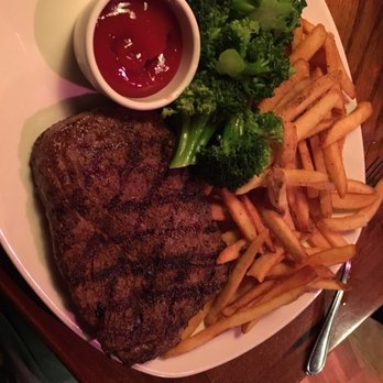 Outback Steakhouse - Rib eye with fries and broccoli. Rare. Not good. Very tough meat - Steakhouses Near Me - Bothell, Washington