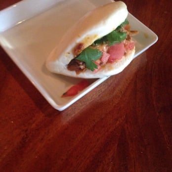 Mopho - Steamed pork bun dressed with watermelon. - Vietnamese Near Me - New Orleans, Louisiana Mopho - Steamed pork bun dressed with watermelon. - Vietnamese Near Me - New Orleans, Louisiana