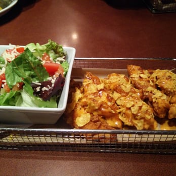 Kelseys Original Roadhouse - The cool ranch Dorritos covered chicken fingers.... And side garden salad - Comfort Food Near Me - Bolton, Ontario