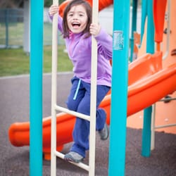 Rancho Rinconada Recreation & Park District - One of our regular Kids'  Night Out children enjoying playing on the playground.