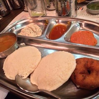 Indian Tiffin Room - Idly Vada. Menu says combination of doughnut and dumplings. Was more like a loose cake texture. Ring is deep fried version - Indian Near Me - Cheadle, XGM
