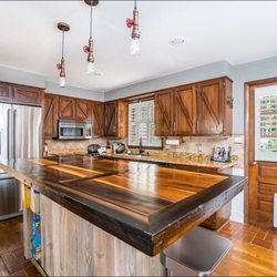 Georgia Artisan - Custom Built Kitchen Island with a Repurposed Poplar Wood Front Door.
