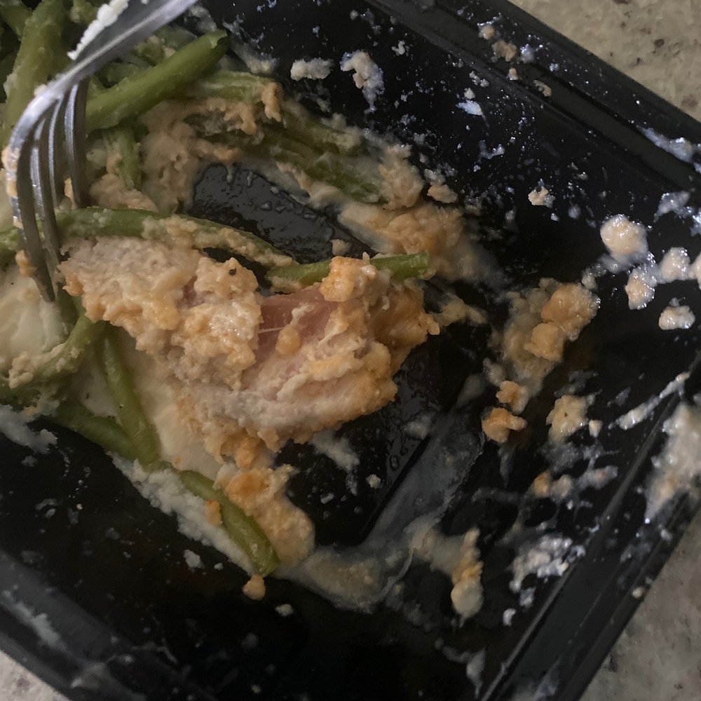 a plate of food with a fork in it