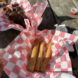 Lumpia King - Pork lumpia and pork BBQ skewers