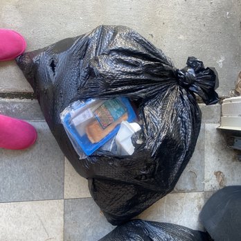 Lucy's Cleaning Service - Trash bag full of expired food including fish - Home Cleaning Near Me Lucy's Cleaning Service - Trash bag full of expired food including fish - Home Cleaning Near Me