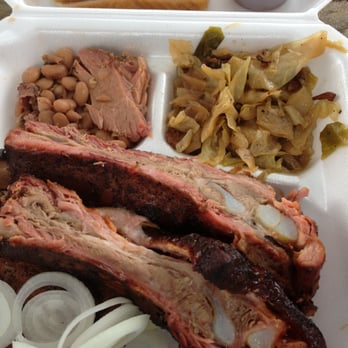Brown's Bar-B-Que - The two meat plate: pork spareribs, chicken thigh + sides of simmered cabbage and meaty beans. - Barbeque Near Me - Austin, Texas