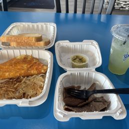 Breakfast lamb plate, with lamb on side usually goes in between the omelette. Breakfast lamb plate, with lamb on side usually goes in between the omelette.