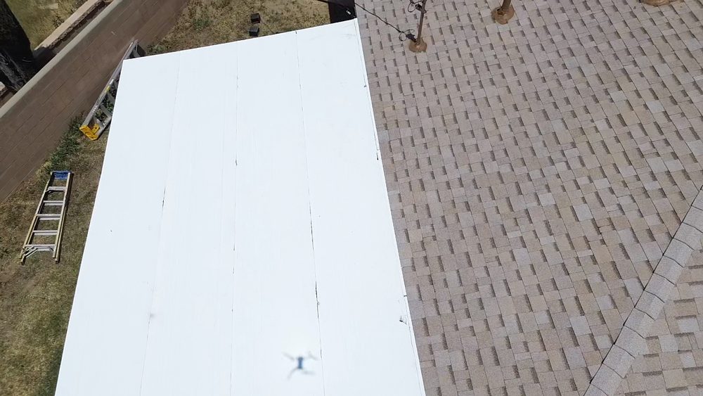 Slide of Sandoval Roofing