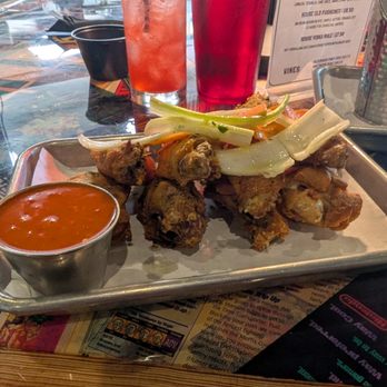 Continues Arcade - Chicken wings with buffalo sauce. Wings are never tossed in sauce; always served on the side - Bars Near Me - Alexandria, Virginia