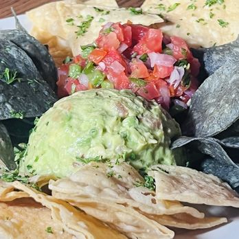 Saint Felix - Chips, salsa, and guac shareable from the happy hour menu - New American Near Me - Los Angeles, California