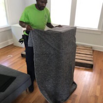 Atlanta Premier Movers - Here goes Derrick wrapping one of our happy customers furniture. Call us for all your moving needs. - Movers Near Me - Atlanta, Georgia Atlanta Premier Movers - Here goes Derrick wrapping one of our happy customers furniture. Call us for all your moving needs. - Movers Near Me - Atlanta, Georgia