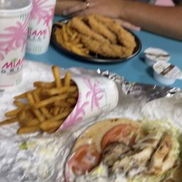 Our food; a chicken pita sandwich and chicken platter! Our food; a chicken pita sandwich and chicken platter!