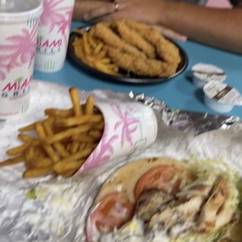 Miami Grill - Our food; a chicken pita sandwich and chicken platter! - Chicken Wings Near Me - Key West, Florida Miami Grill - Our food; a chicken pita sandwich and chicken platter! - Chicken Wings Near Me - Key West, Florida