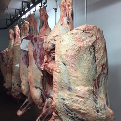 Bostrom Farms - Hanging local beef. Not everyone gets to see this either. It's amazing. The commitment to quality is huge.