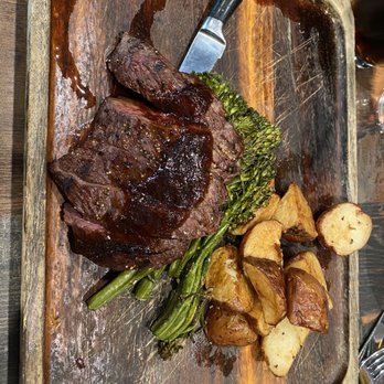 Revel - Flank steak, broccolini, roasted potatoes - Bars Near Me - Pittsburgh, Pennsylvania
