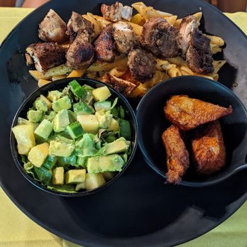 Afrodisiac - Cucumber Avocado pineapple salad, fried plantains, Rasta Pasta - Caribbean Near Me - New Orleans, Louisiana Afrodisiac - Cucumber Avocado pineapple salad, fried plantains, Rasta Pasta - Caribbean Near Me - New Orleans, Louisiana