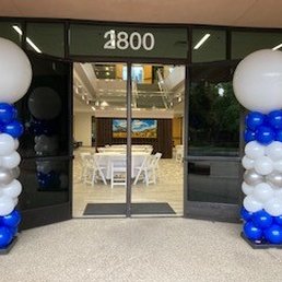 Exterior outside entrance of Lush Balloons - Two balloon arrangements at the entrance of building. - Roseville, California Exterior outside entrance of Lush Balloons - Two balloon arrangements at the entrance of building. - Roseville, California