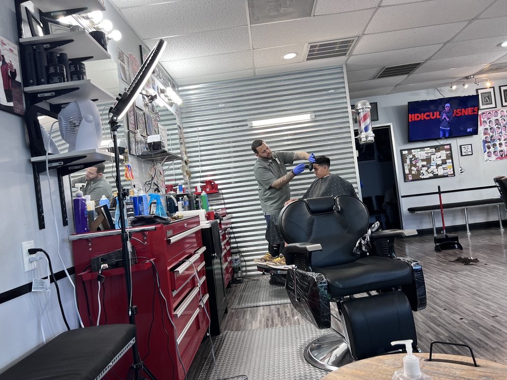 Good Looks Barbershop Logo