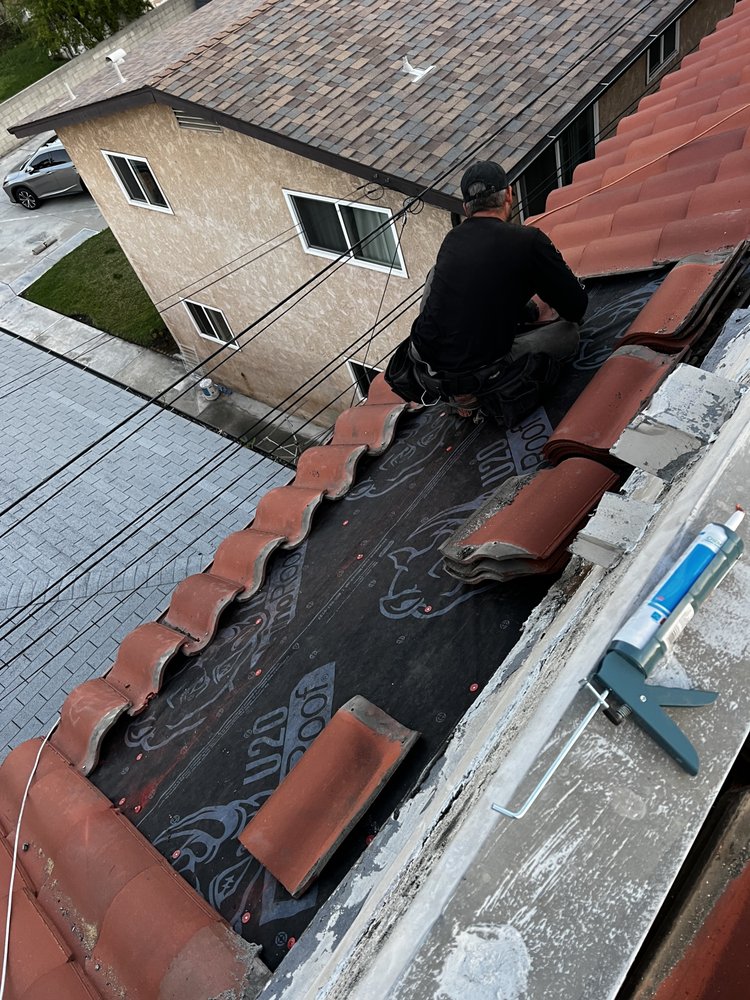 Slide of Kayhan's Roofing