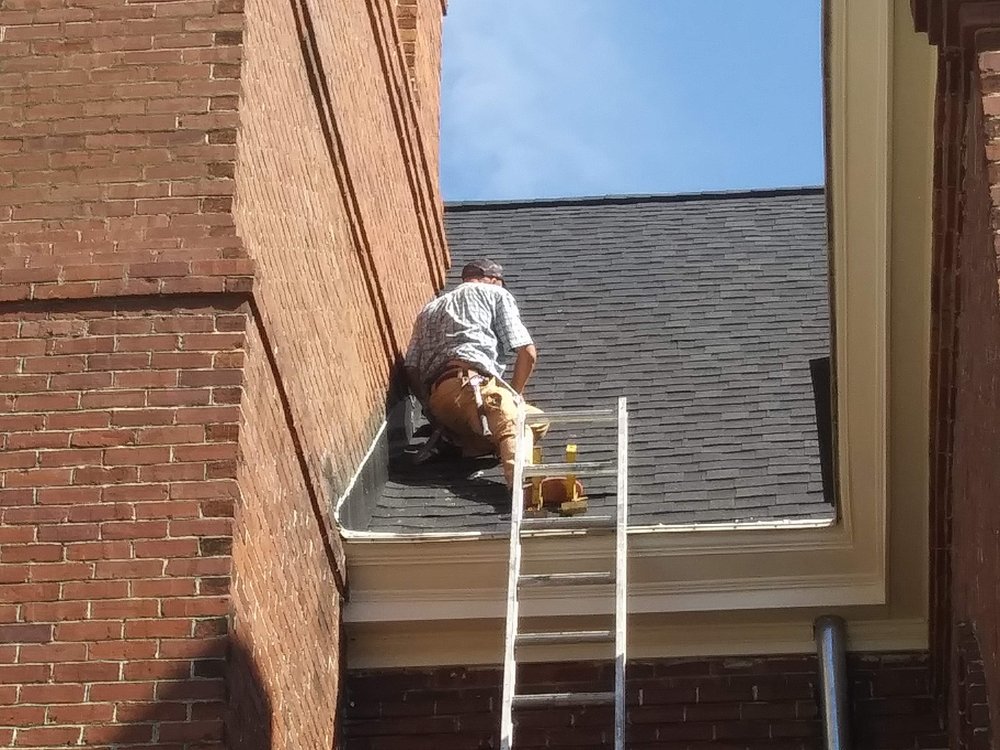 Slide of Robert W Nunnery Roofing