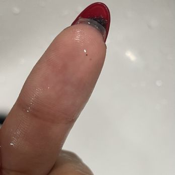 D's House Nails - Food getting stuck inside of the nail because the nail is not glued down properly - Nail Salons Near Me - Pleasant Hill, California