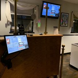 There are dividers between the booth and visitors as well as at the snack bar.