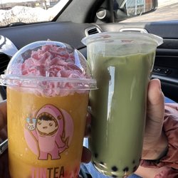 Mango tea with passion fruit popping boba  Matcha milk tea with tapioca pearls
