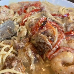 Chicken and shrimp fettuccine swimming in sauce. Finally!!!!!!!!!!!!! Chicken and shrimp fettuccine swimming in sauce. Finally!!!!!!!!!!!!!