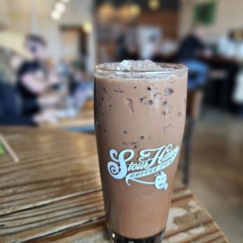 Stouthaus Coffee Pub - Iced mocha latte - Coffee & Tea Near Me - Sunset Valley, Texas Stouthaus Coffee Pub - Iced mocha latte - Coffee & Tea Near Me - Sunset Valley, Texas