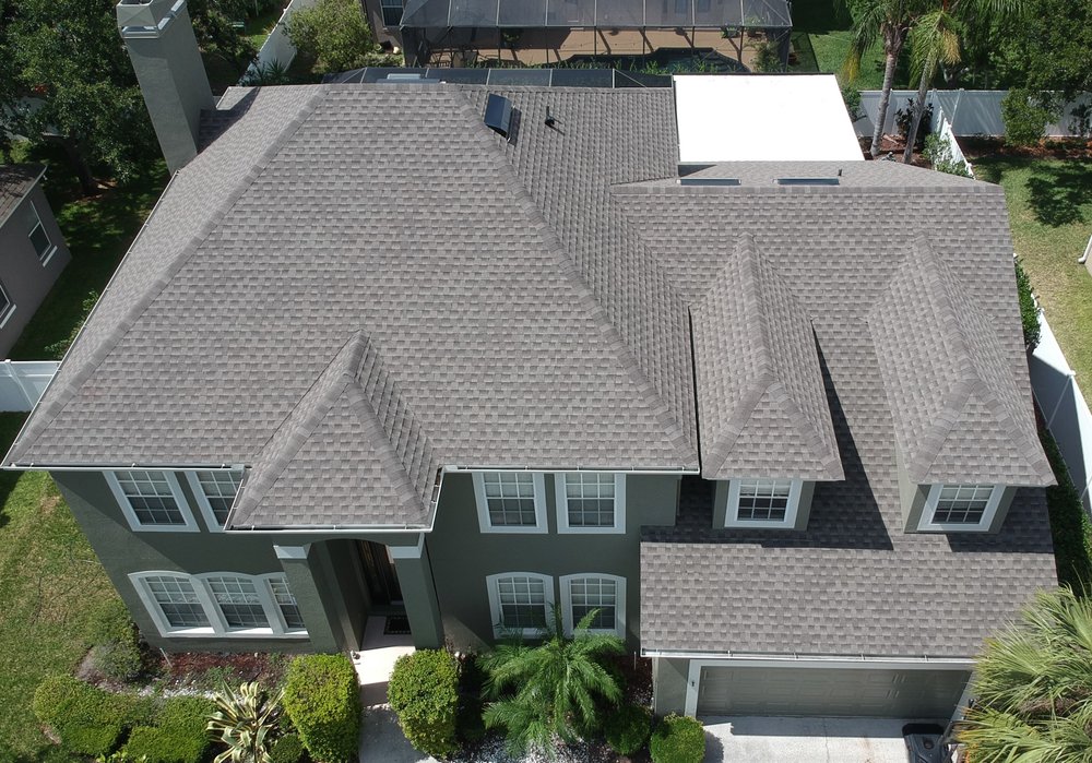 Slide of One World Roofing