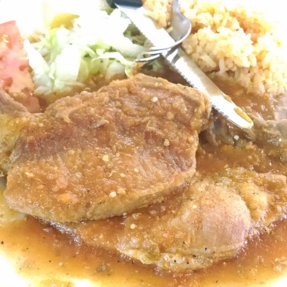 Raul's Restaurant - Pork chops in red hot sauce with rice and beans. Just awesome! - Mexican Near Me - Dallas, Texas