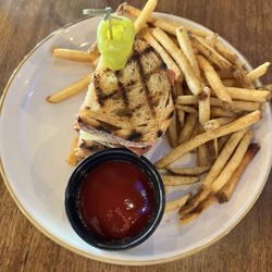 Eleven Eleven Kitchen and Bar - Bourdain sandwich with pepperoncini and warm, not hot, fries