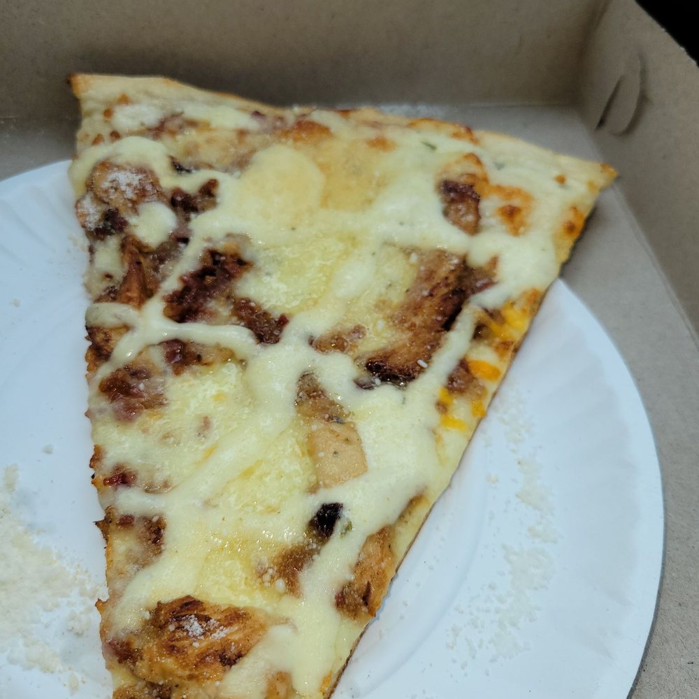 a slice of pizza in a box a slice of pizza in a box