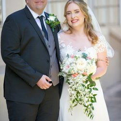 The Bride and Groom with our gorgeous flowers (Photo Credit: Amity Mason Photography)
