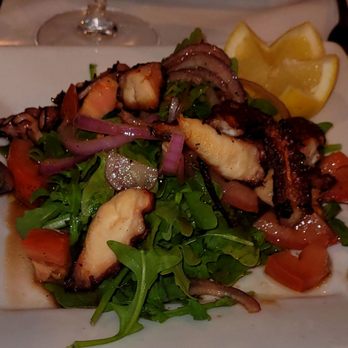 Da Noi Italian Restaurant - Octopus over a bed of arugula - Italian Near Me - Islip, New York Da Noi Italian Restaurant - Octopus over a bed of arugula - Italian Near Me - Islip, New York