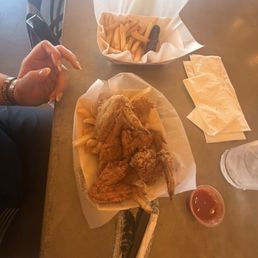 Catfish & Chicken Combo (Small + Dark) 3/10 terrible catfish was overcooked and under seasoned and wings were under cooked Catfish & Chicken Combo (Small + Dark) 3/10 terrible catfish was overcooked and under seasoned and wings were under cooked