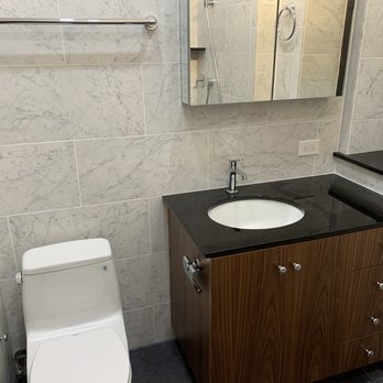 Gaudioso Contracting, Inc - a bathroom with a toilet and sink - General Contractors Near Me - Brooklyn, New York Gaudioso Contracting, Inc - a bathroom with a toilet and sink - General Contractors Near Me - Brooklyn, New York