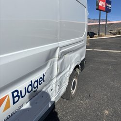 Avis Budget - The entire side of the truck was caved in. This is not a roadworthy vehicle.