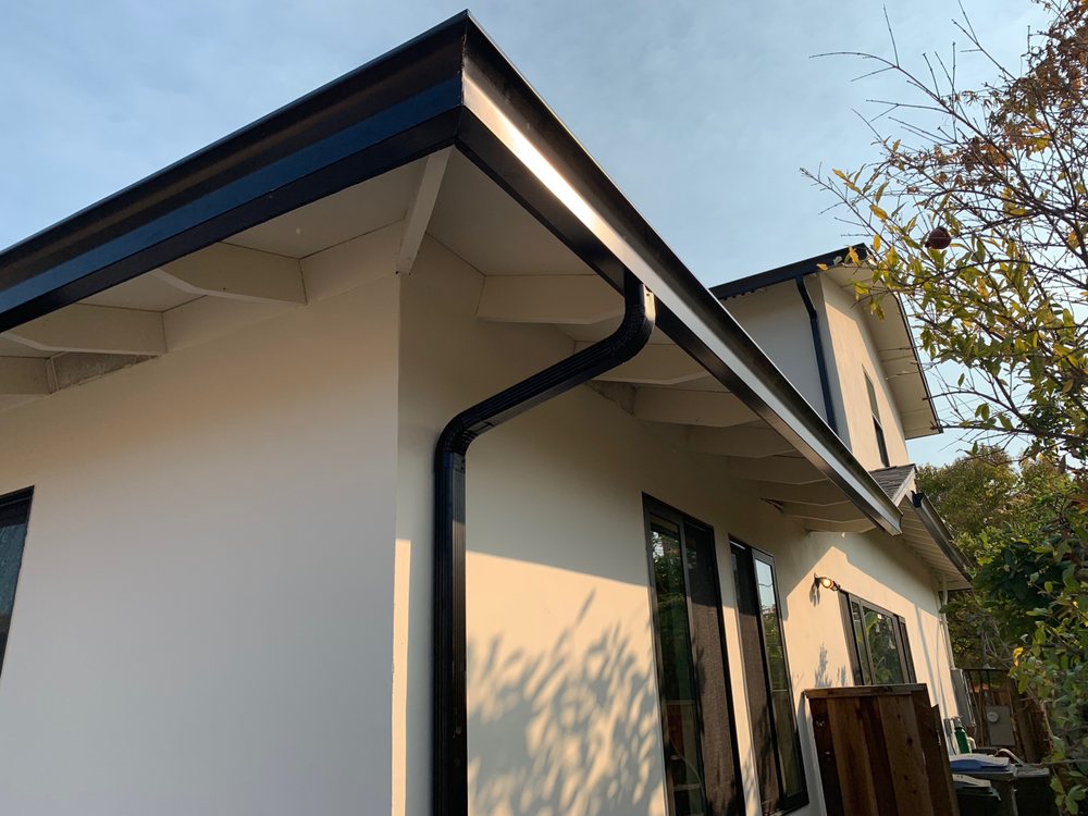 Slide of Signature Rain Gutters & Metal Works